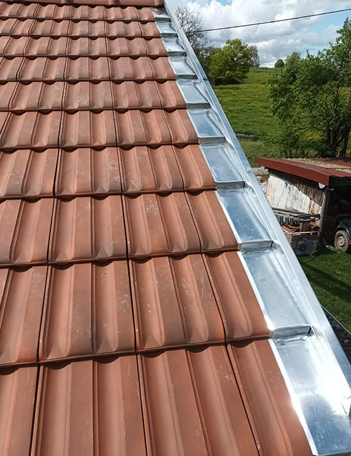 Experts en Travaux de Zinguerie : Installation et Réparation de Gouttières, Lucarnes et Plus dans le Haut-Rhin (68)